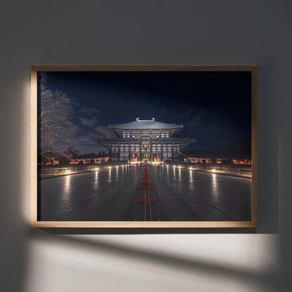 Night city building illuminated with warm lights, framed as art wall poster.