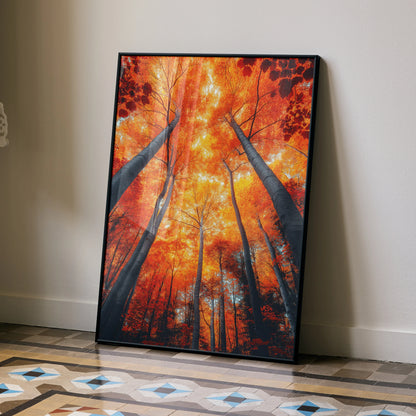 Vertical poster wall art featuring vibrant autumn trees with fiery orange leaves and dark tree trunks reaching skyward.