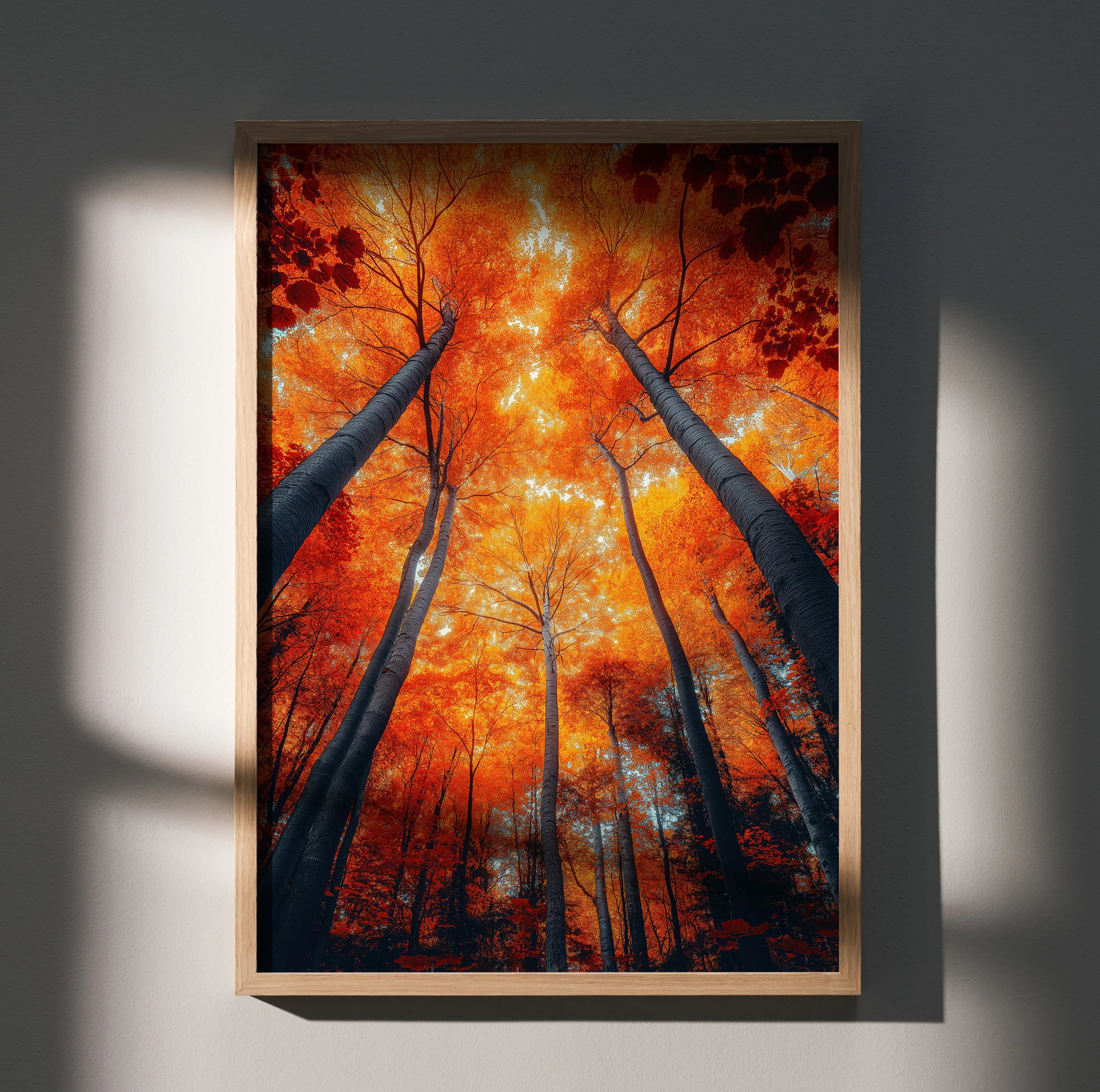 Vertical wall art poster featuring vibrant autumn trees with fiery orange leaves against a dark forest background.