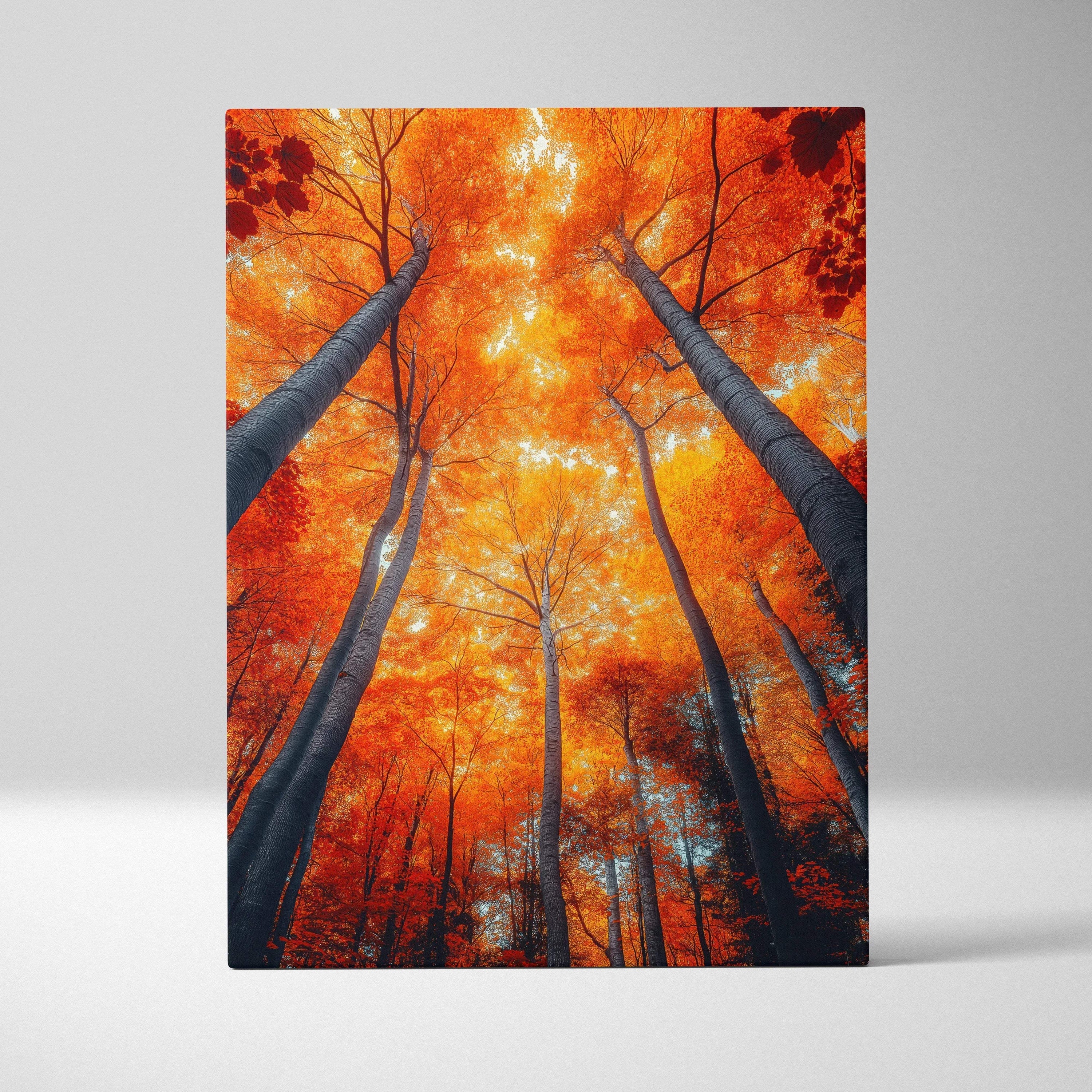 Vertical canvas wall art featuring vibrant autumn forest with fiery orange leaves and tall tree trunks.
