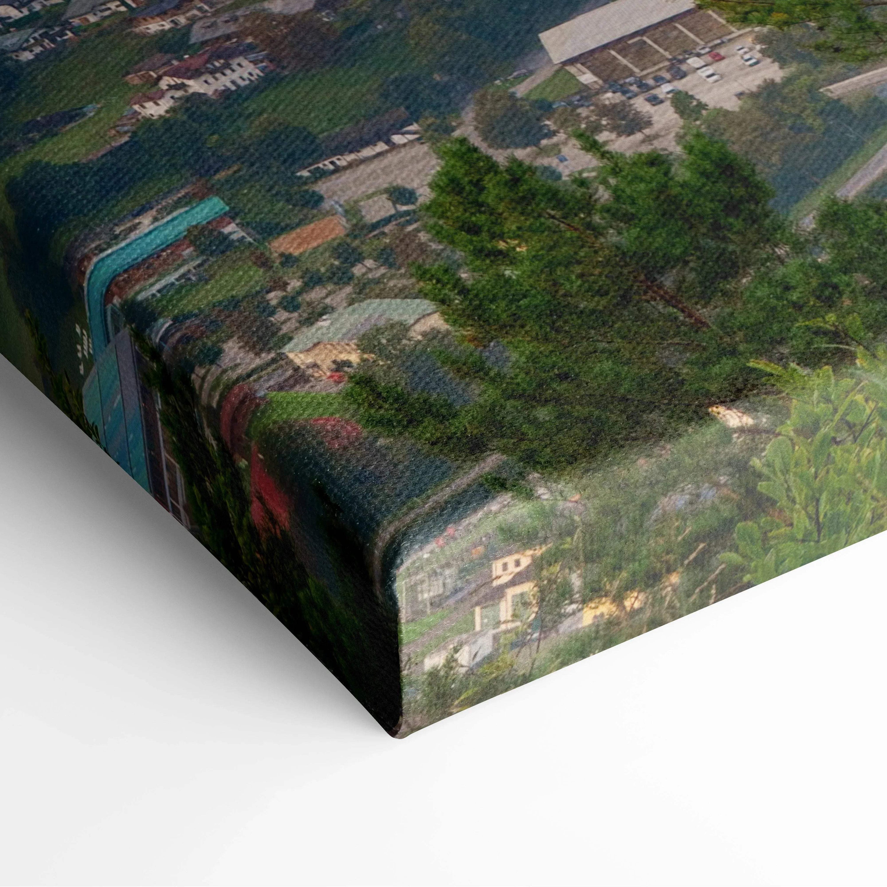 Close-up of canvas wall art showcasing detailed texture and vibrant mountain sunset colors.