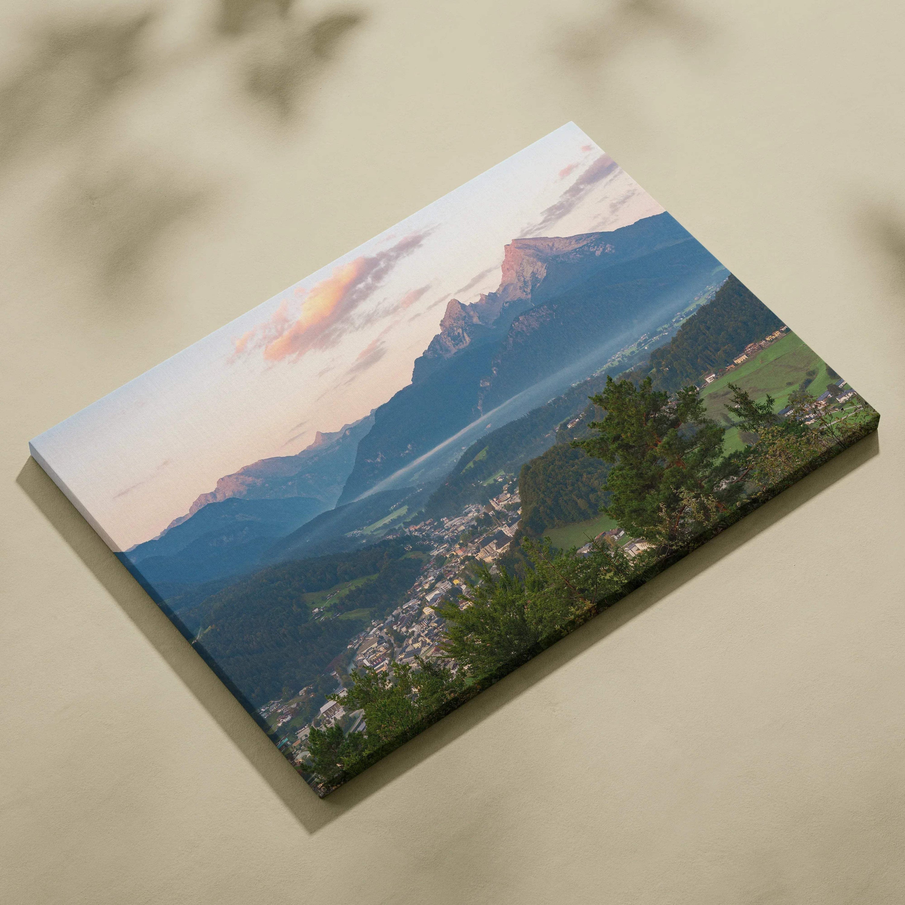 Canvas wall art featuring a mountain landscape at sunset with soft pink and blue hues.