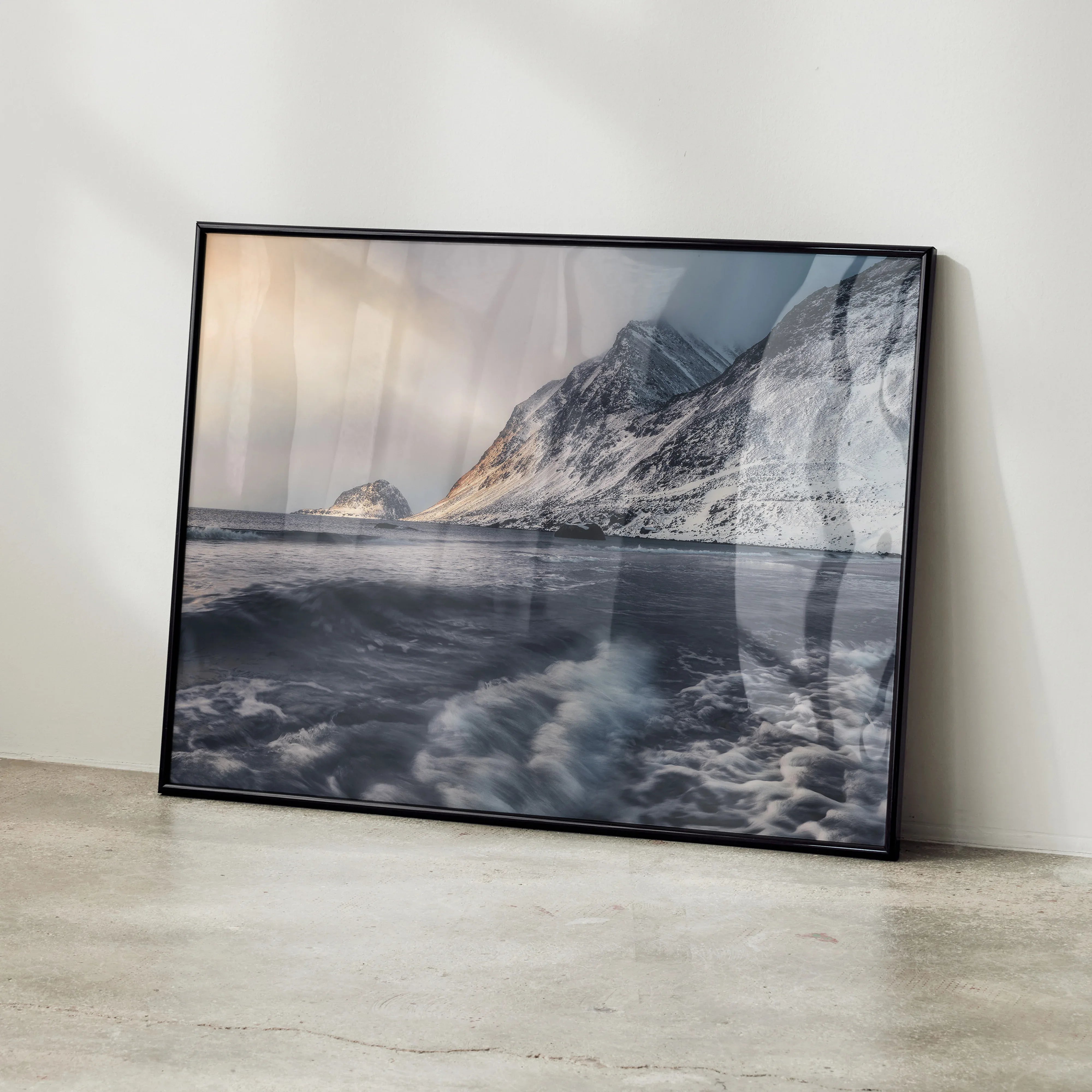 Majestic mountain sunset poster with snowy peaks and dark ocean waves wall art.