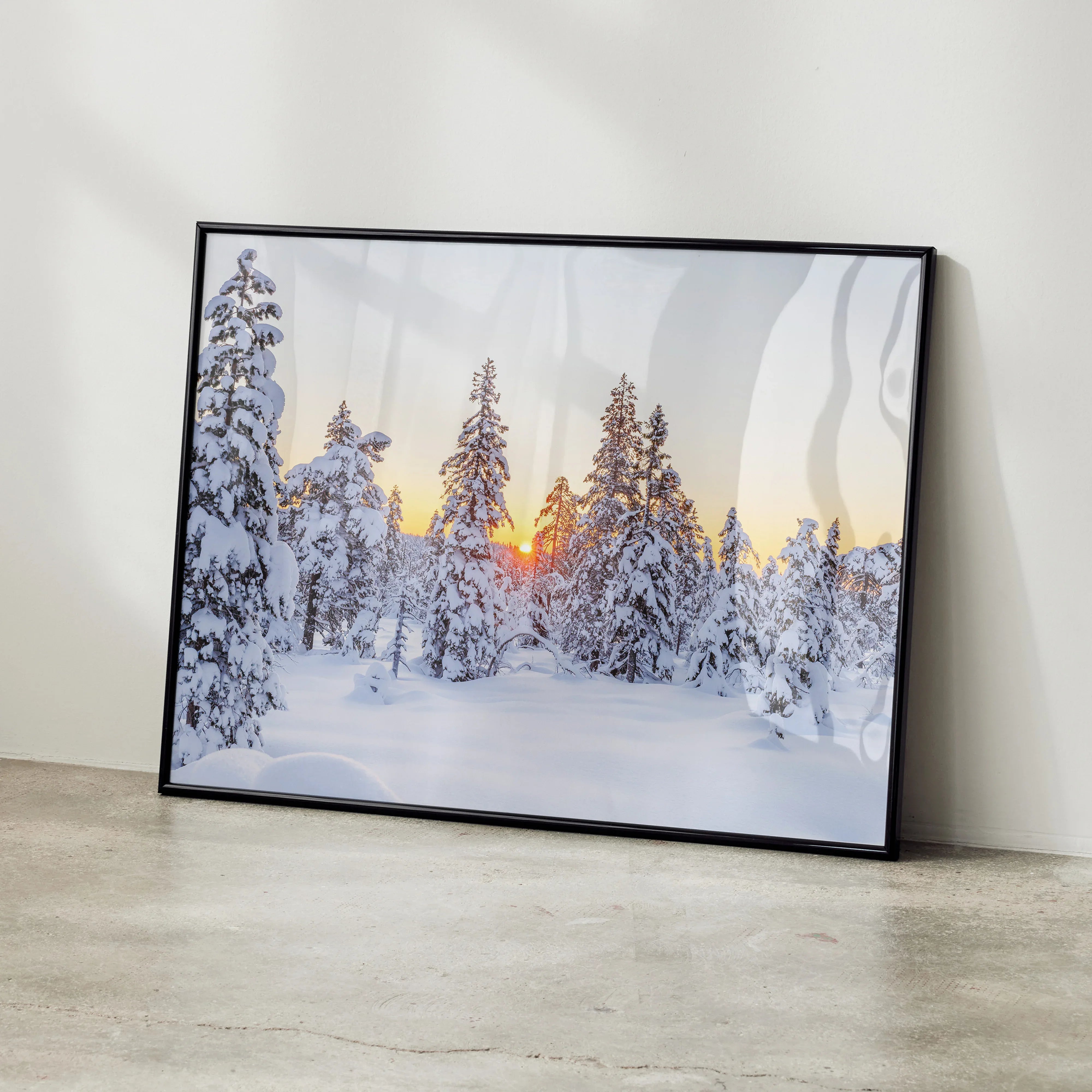 Serene snowy mountain landscape poster with sunlit pine trees, winter nature wall art.