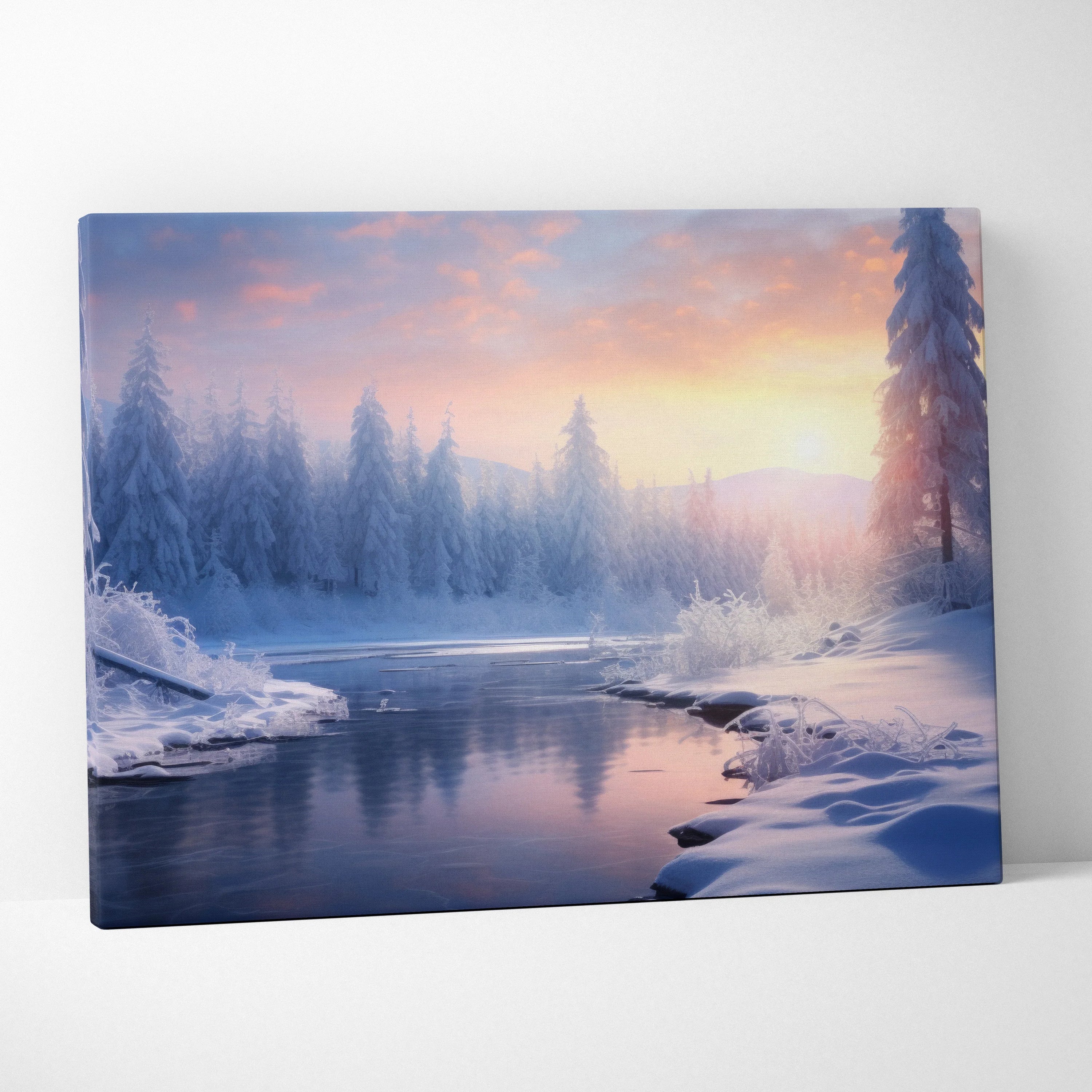 Canvas wall art depicting a snowy winter landscape at sunset with soft pink and orange skies over a river and snow-covered.