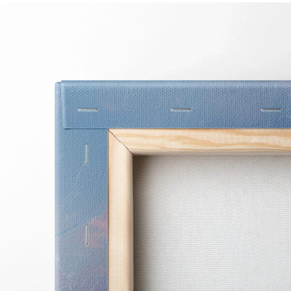 Close-up of canvas corner stretched over wooden frame, textured fabric with blue painted edge.
