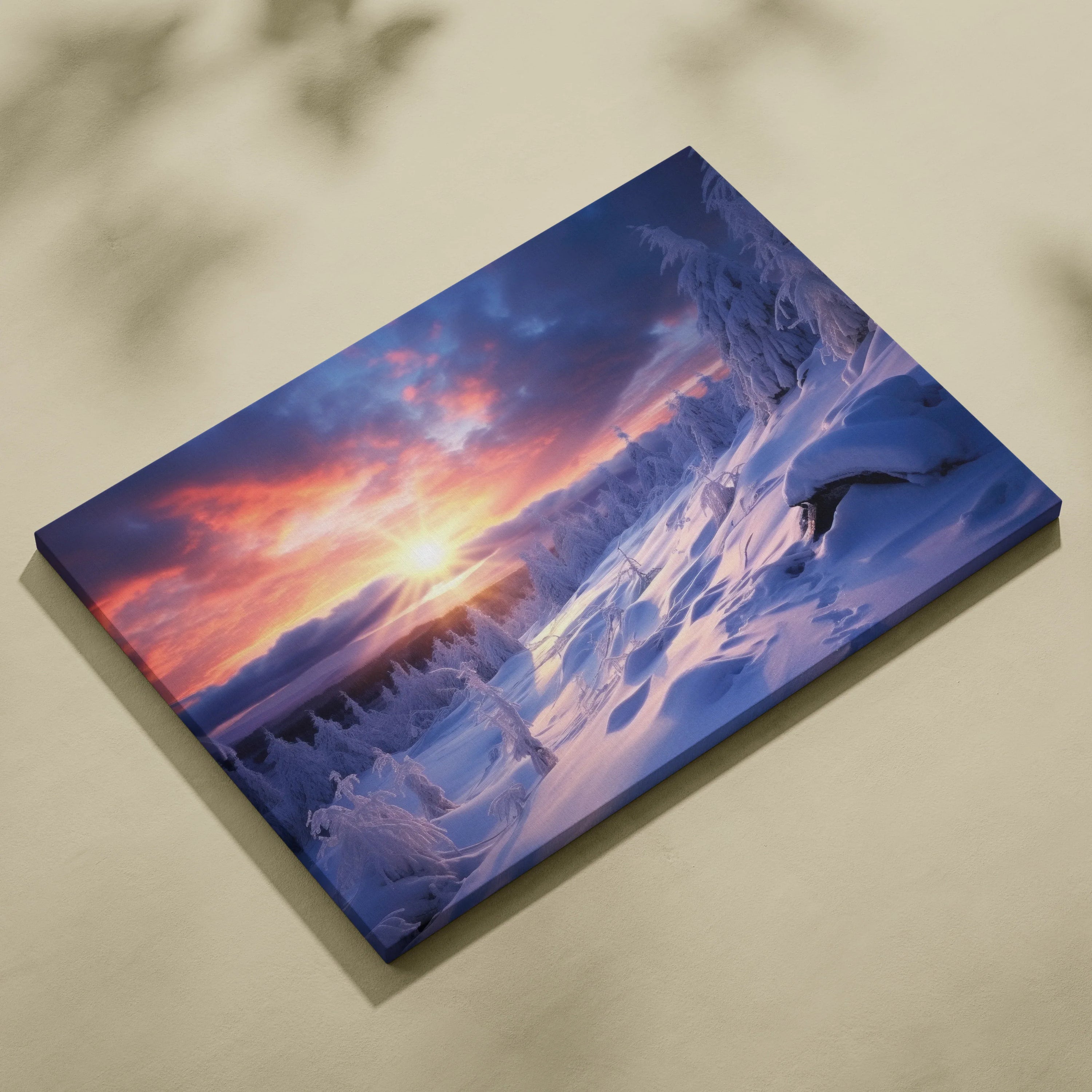 Canvas wall art featuring a snowy mountain landscape at sunset with vibrant orange and purple skies.