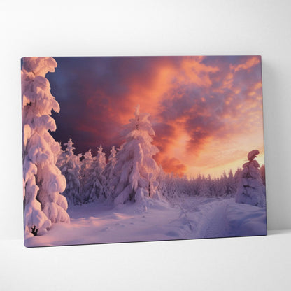 Canvas wall art featuring a snowy forest at sunset with vibrant orange and purple skies.