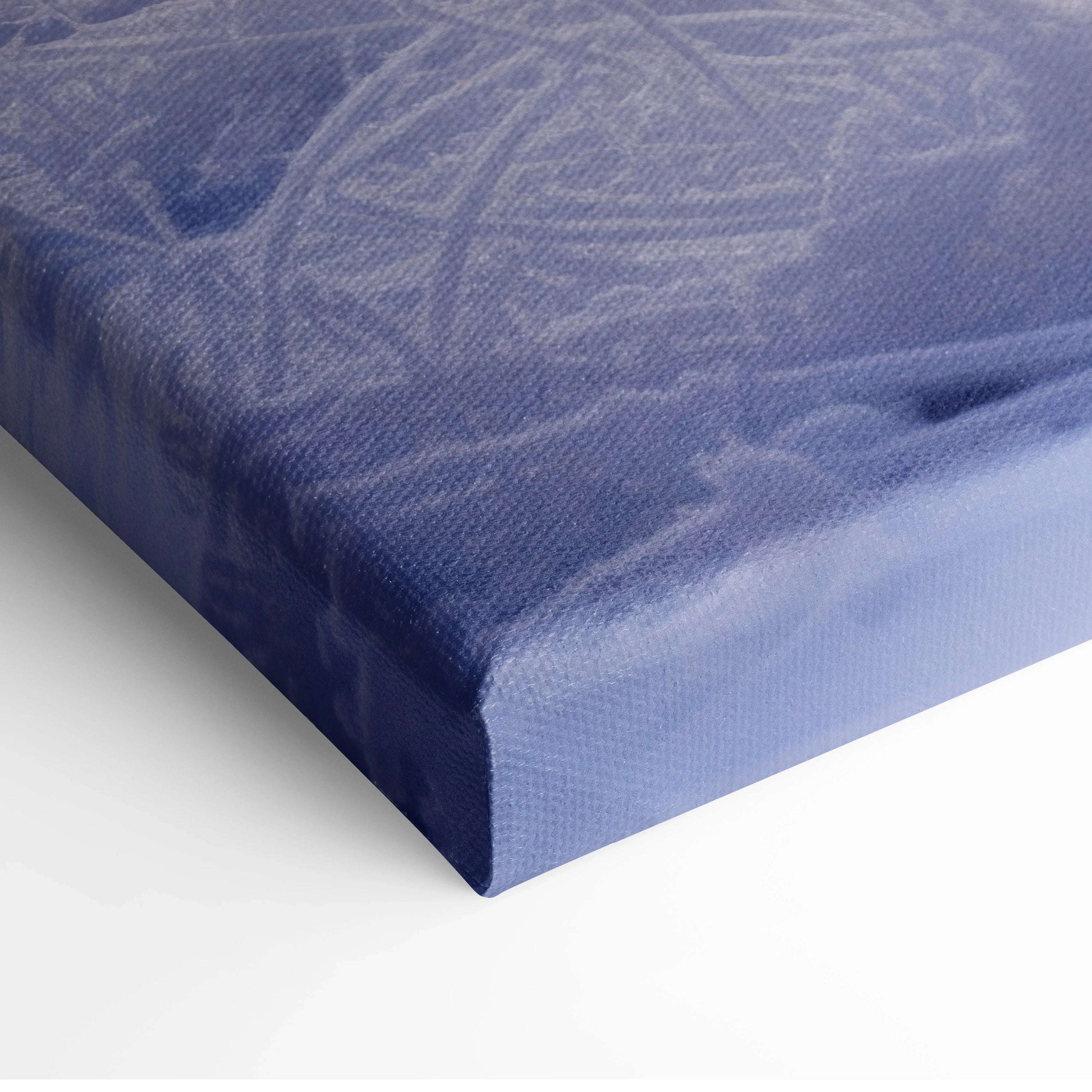 Canvas wall art featuring a snowy winter landscape with soft purple and blue tones, showcasing a dreamy sunset sky.