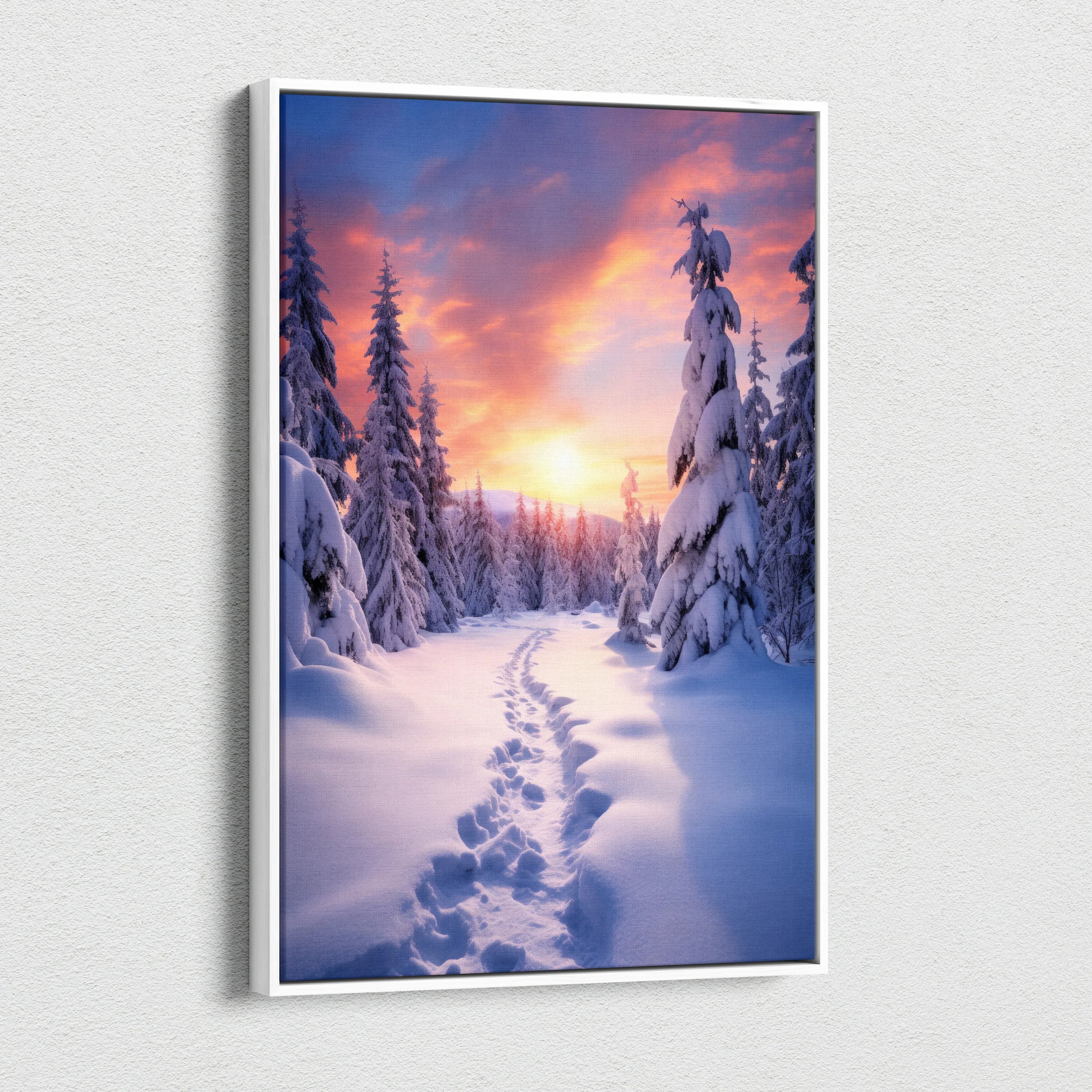 Canvas wall art featuring a snowy forest path at sunset with vibrant pink and orange skies.