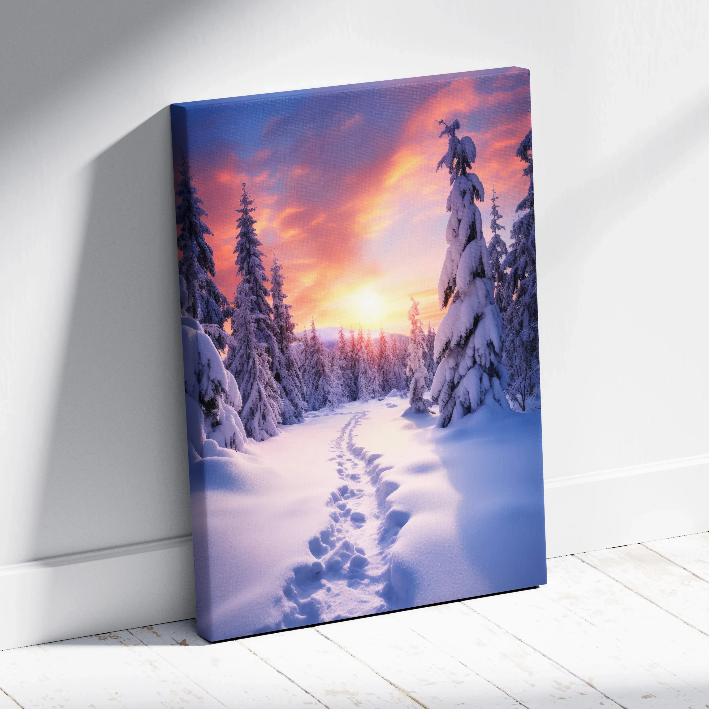 Canvas wall art featuring a snowy forest path with tall pine trees under a vibrant orange and purple sunset sky.
