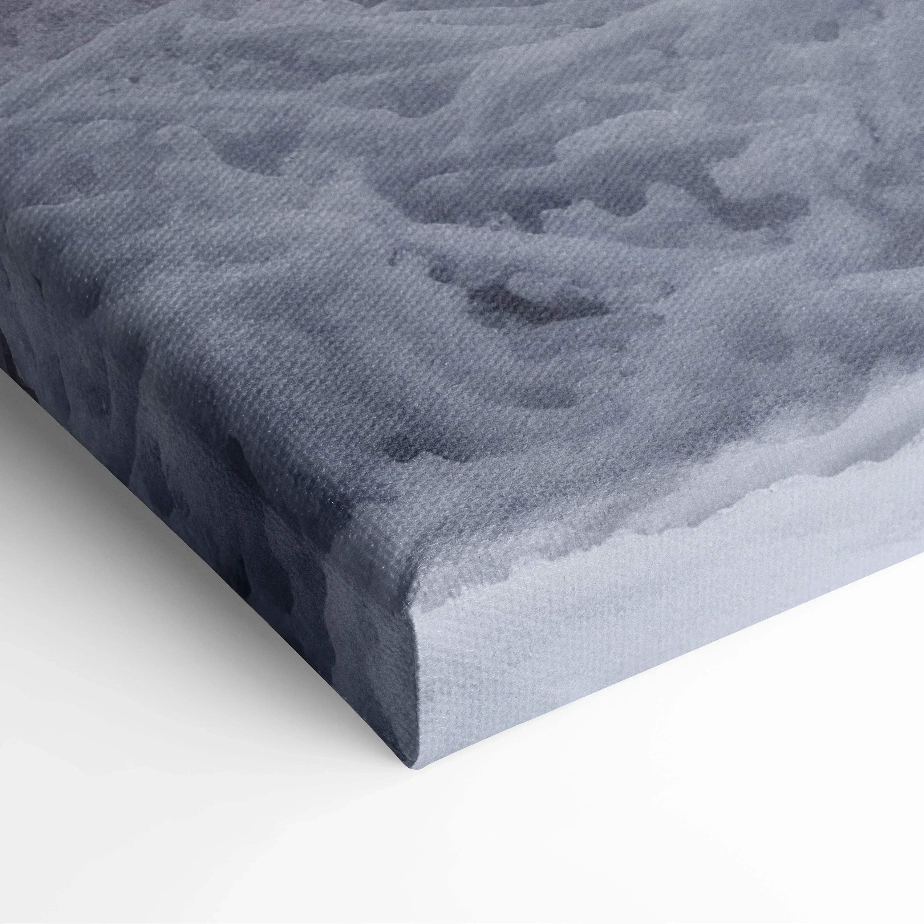 Canvas wall art print with textured fabric showing a snowy, blue-gray winter scene for home decor.
