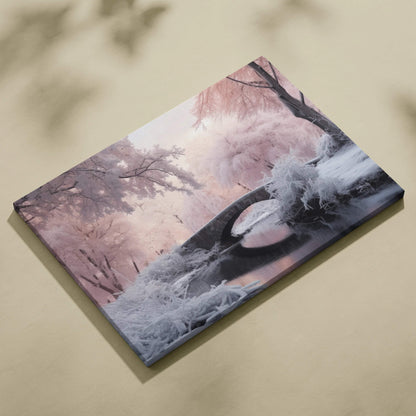 Canvas wall art depicting a snowy bridge in a soft pink and purple winter landscape with frosted trees and serene atmosphere.
