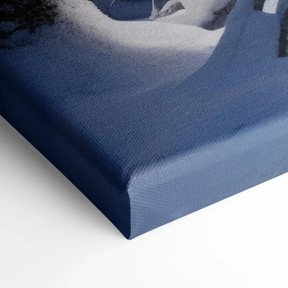 Blue-toned snowy forest scene on textured canvas wall art with tranquil winter decor.