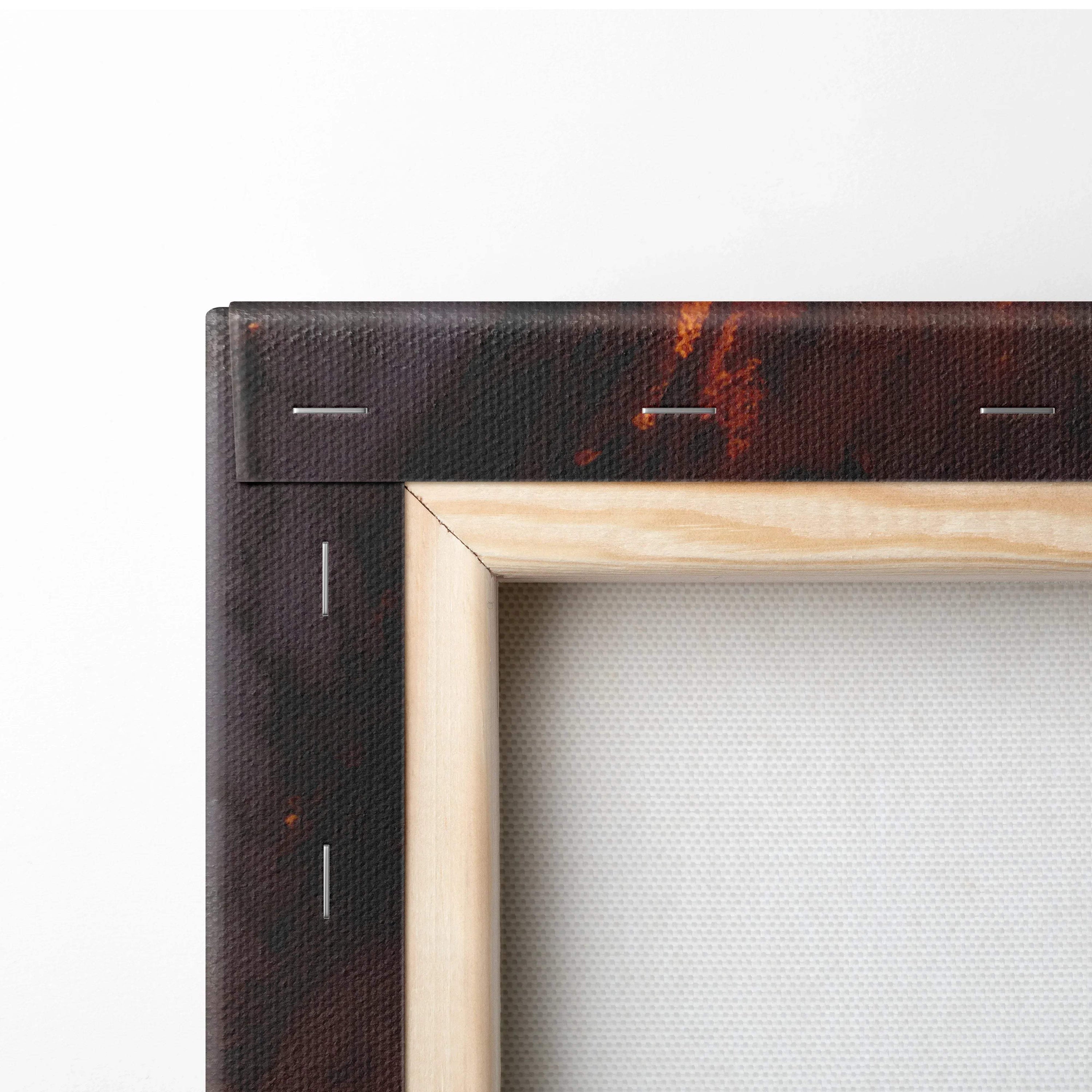 Close-up of wooden frame corner and stretched canvas texture in wall art decor.