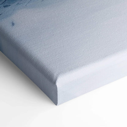 Close-up of white canvas material stretched tightly over wooden frame for wall art decor.