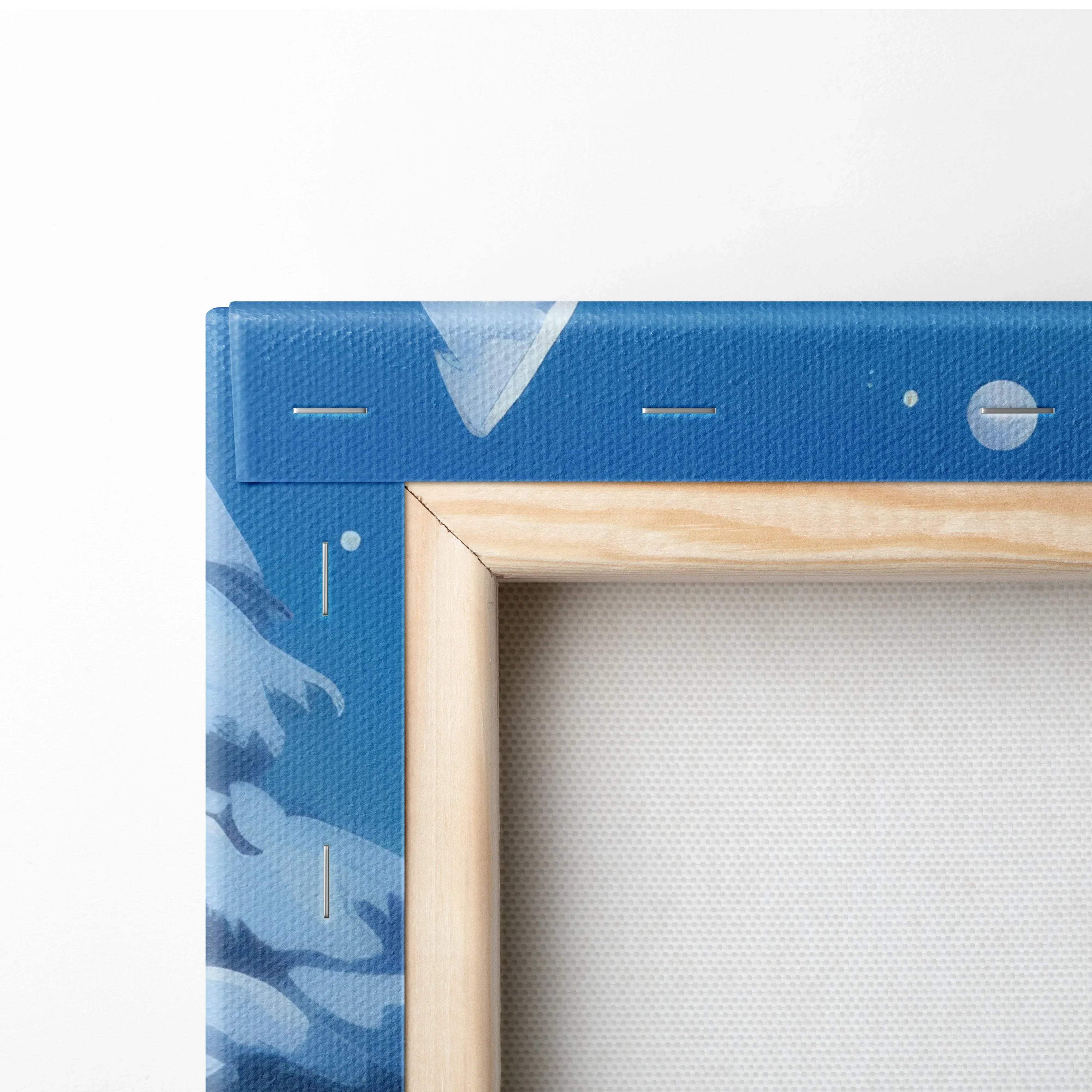 Blue canvas stretched on a wooden frame with visible staples on the edges.
