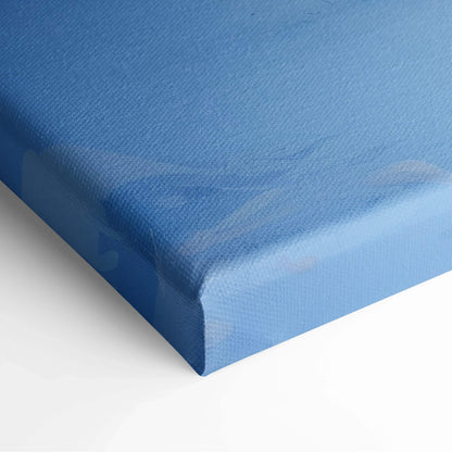 Blue-toned canvas art with subtle snowy landscape and smooth texture, perfect for wall art display.