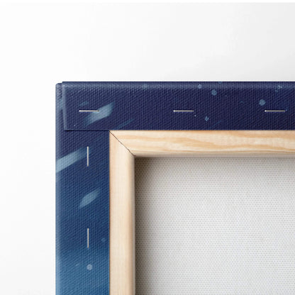 Close-up of wooden frame and navy blue canvas stretcher bar with winter-themed digital print texture.