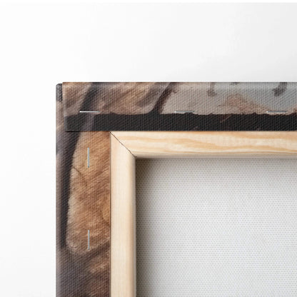 Close-up of wooden frame and canvas edge showing snowy forest and warm sunset colors on wall art canvas.