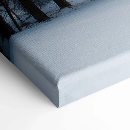 Light blue textured canvas with cinematic snowy forest, alpine cabin and icy cliffs