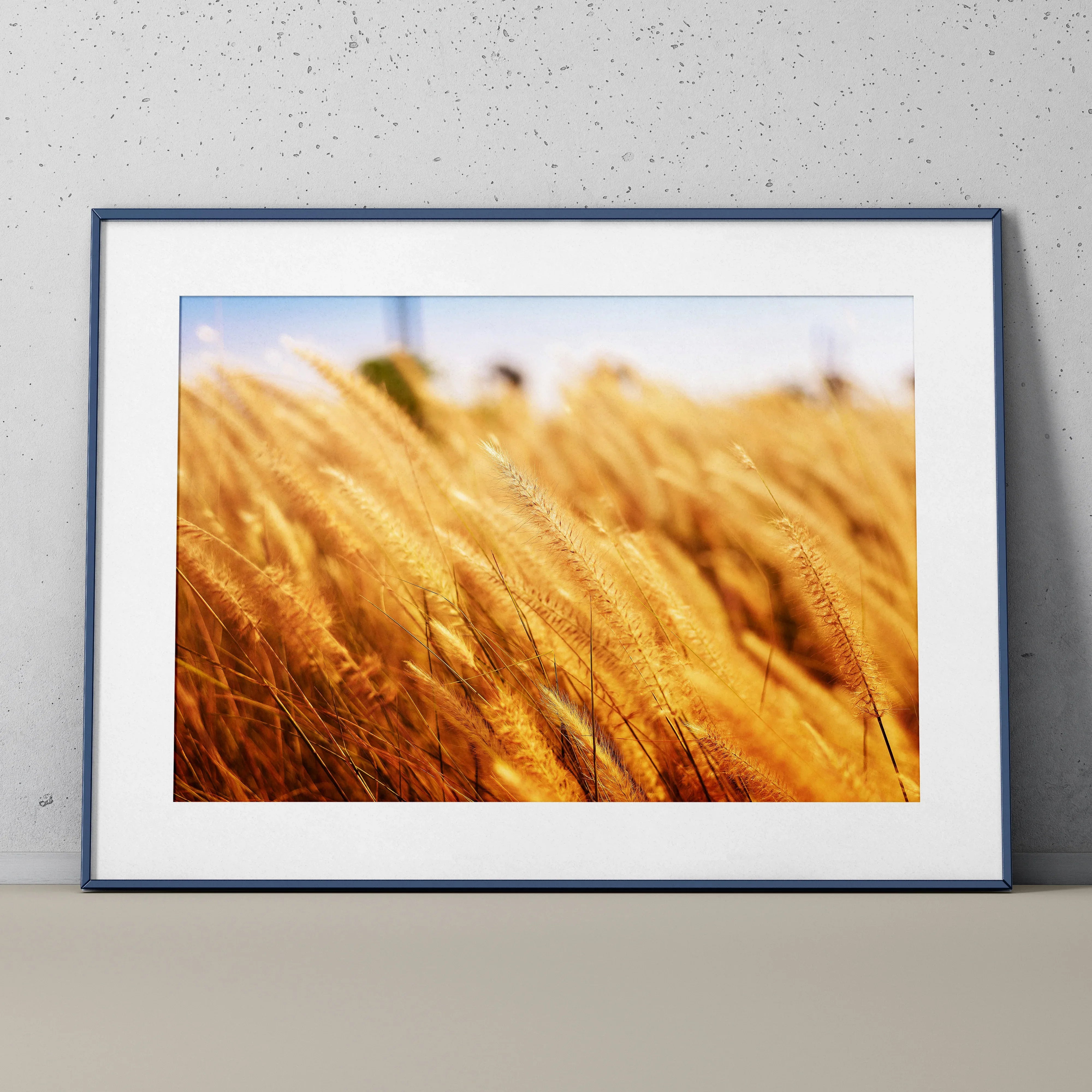 Serene nature landscape poster featuring golden wheat field in soft sunlight, framed wall art.